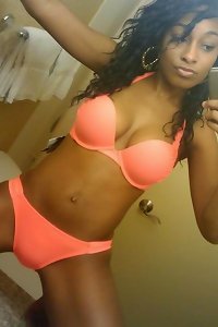 an attractive lady has an enormous dick on her