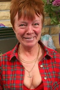 a very sexy brunette woman with a huge ass in stockings