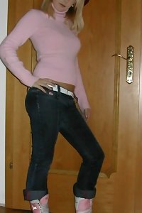 a light-haired female with glasses high heels and stockings